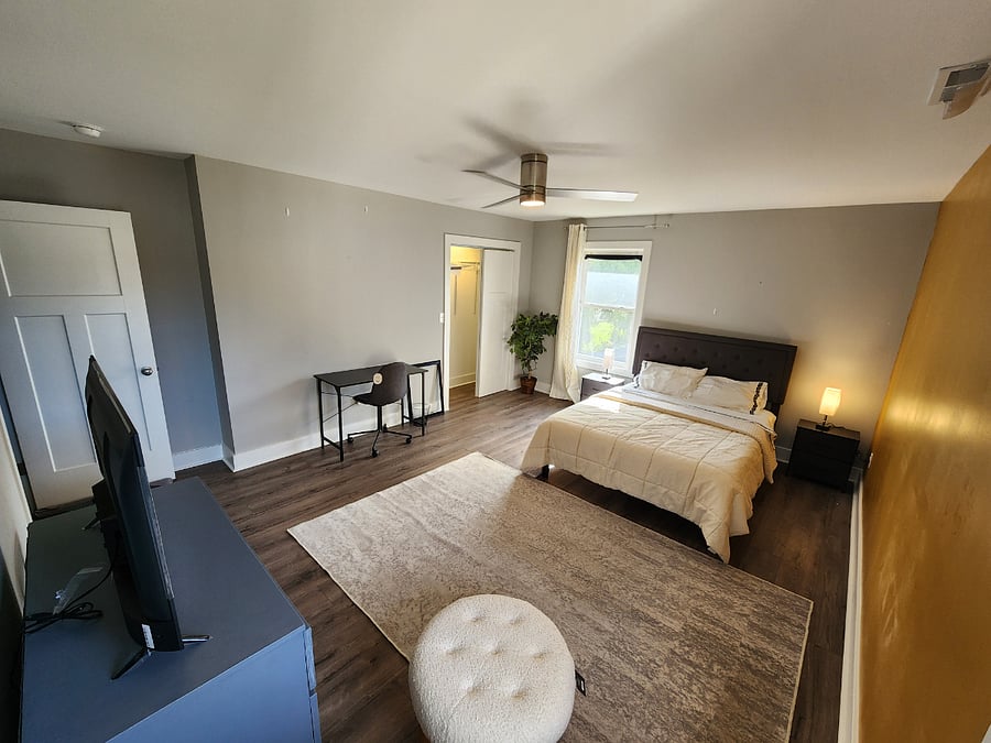 The Beach Room is upstairs. Lots of natural light and shares a full bathroom with double sinks.