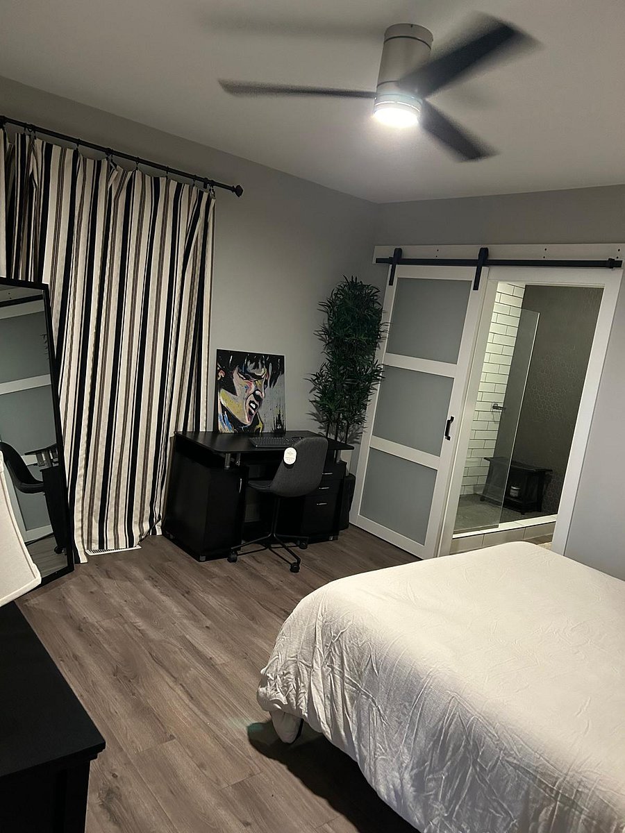 The Cabin is located downstairs. Great for people who need to be in and out all the time. It comes with a full private bathroom, a huge closet, a SmartTV, and a computer desk.