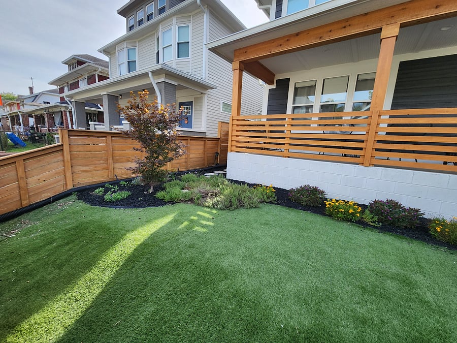 Maintenance-free front yard. Enjoy the soft artificial grass. It is really soft and great for workouts or for relaxing.