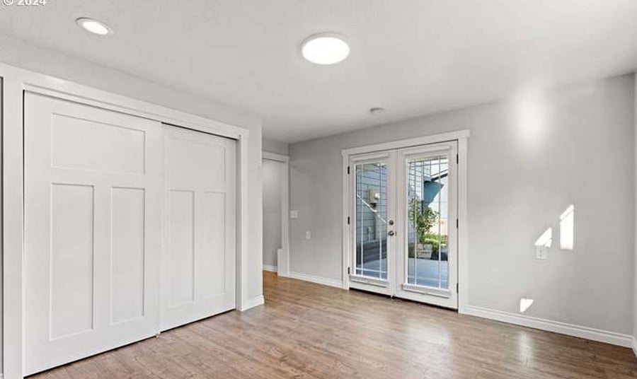 Bedroom, back patio door.
