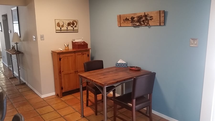 Kitchen eating area, laptop area.