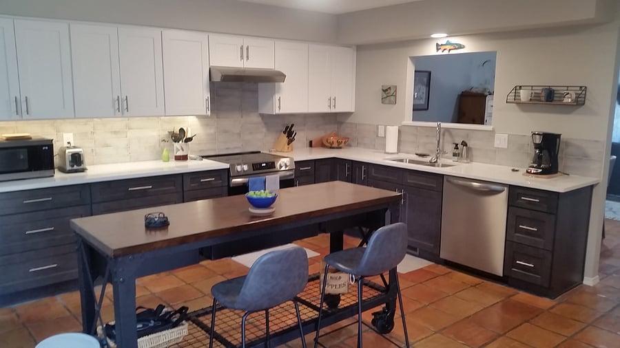 Kitchen island, new range, dishwasher, fridge.
