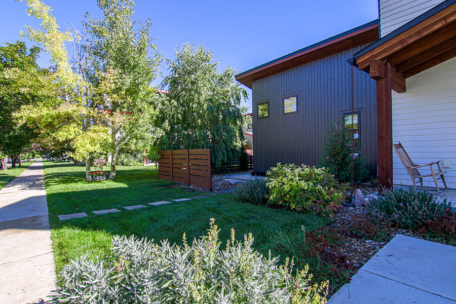 Studio is connected to the north side of the main house (including engineered soundproofing, double-wall features). Private entrance from sidewalk along paver pathway.