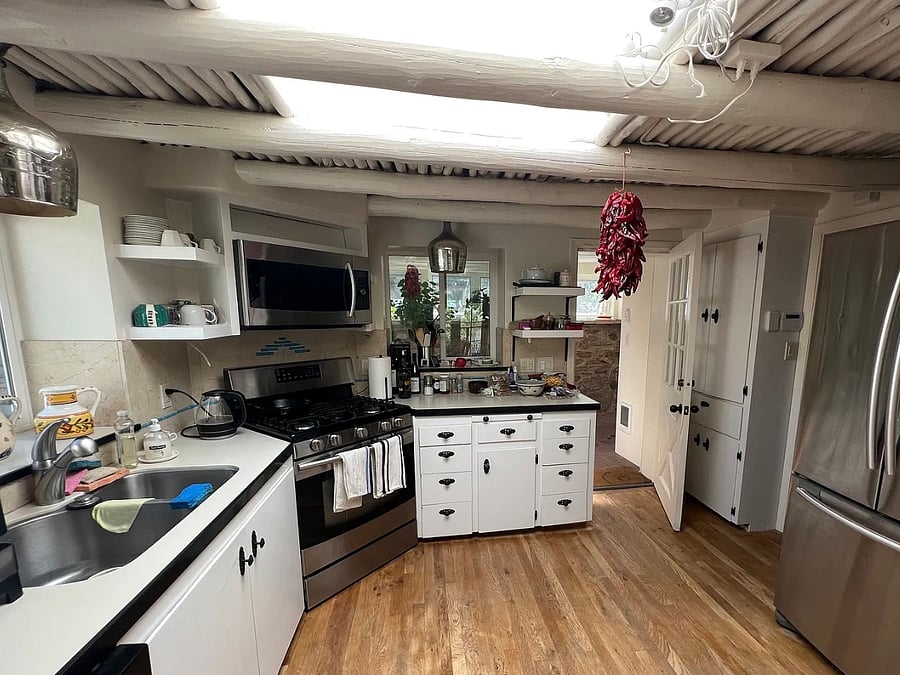 Full kitchen, large pantry on right, (hidden in pic by fridge)