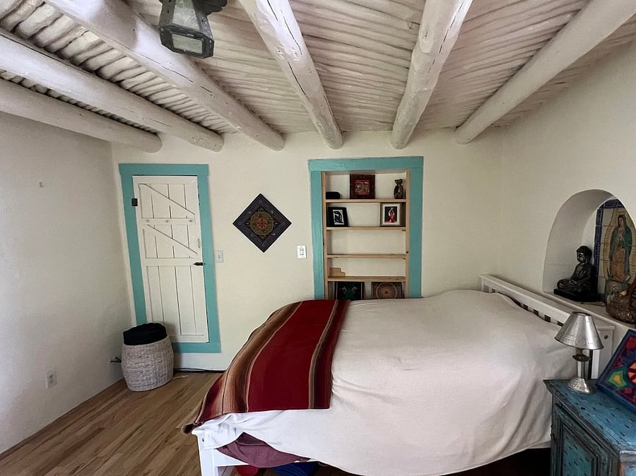 2nd Bedroom, adjoined to living room by door to the left, bathroom by door to right.