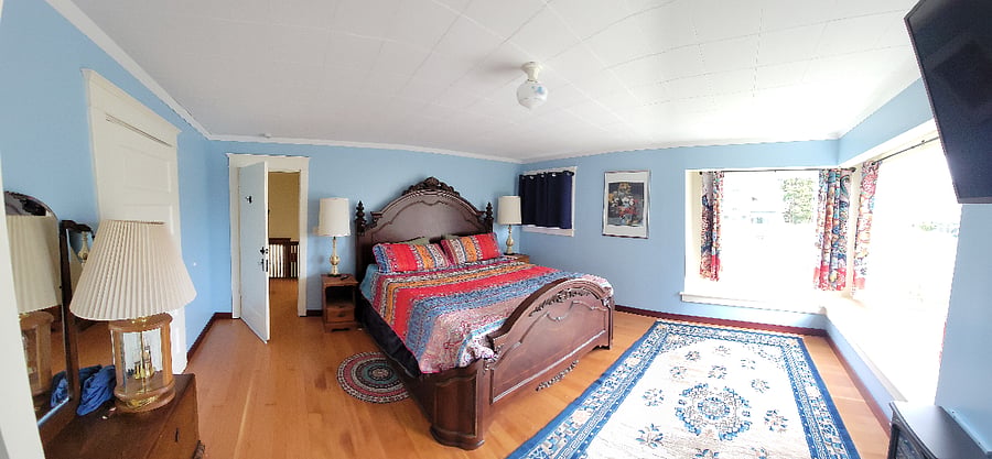 master bedroom with private dressing room and sink