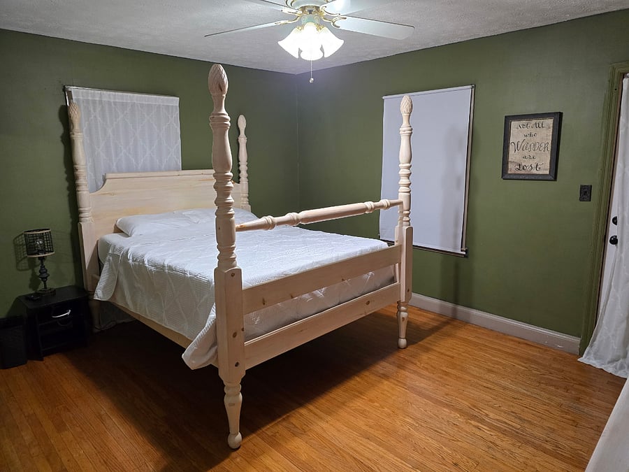 Primary Bedroom with Queen Bed  Fresh linens, blackout curtains, and plenty of storage.