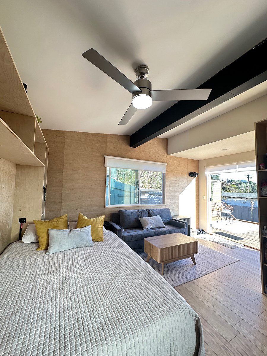 New Murphy Bed with a queen size bed that easily folds up and leaves plenty of space when not in use.