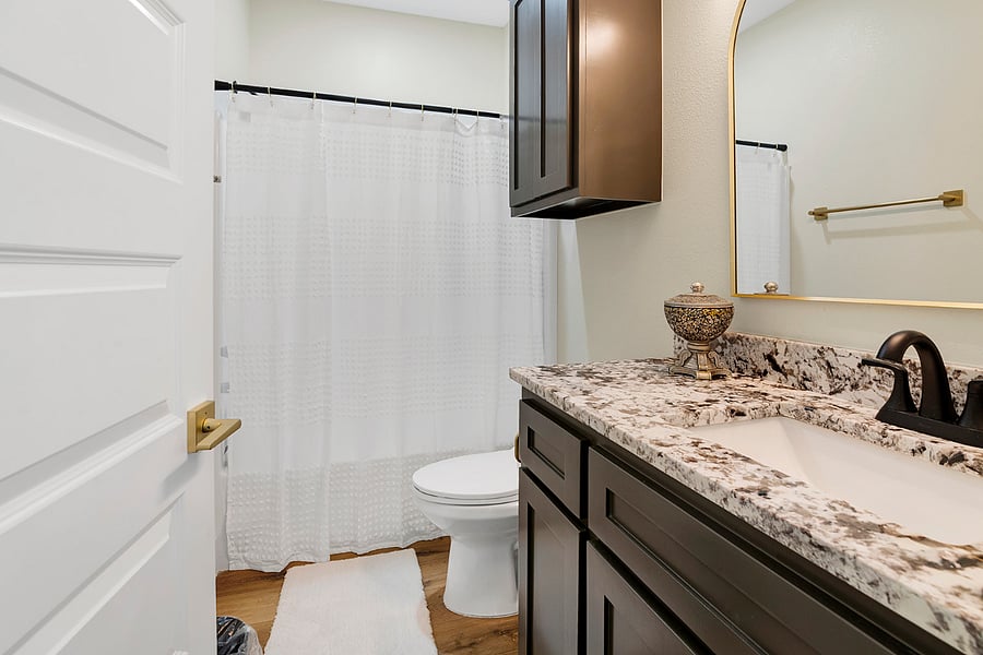 Full bathroom conveniently positioned between Bedrooms 2 and 3