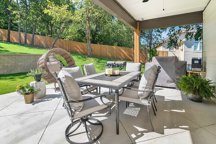 Thoughtfully designed back patio with relaxed seating and a quiet, calming atmosphere.