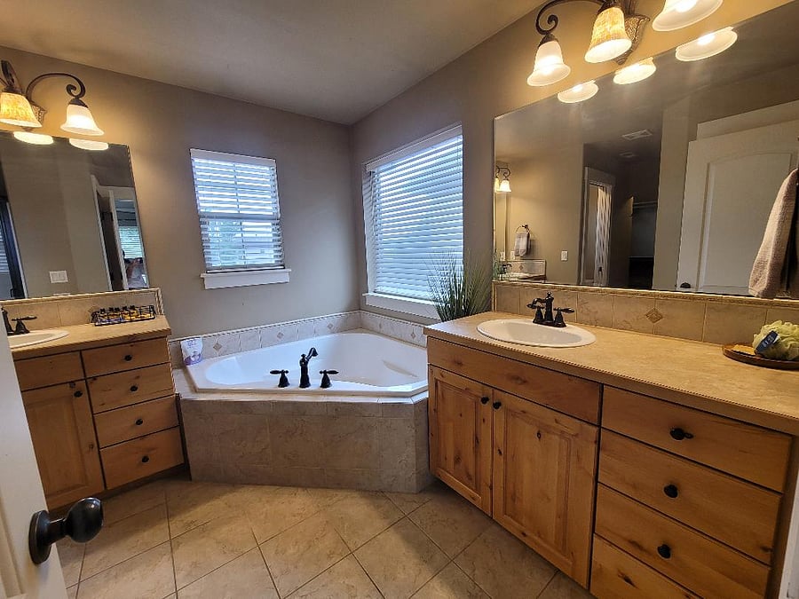 Master Bathroom 1: Separate soaking tub and shower and dual vanities!