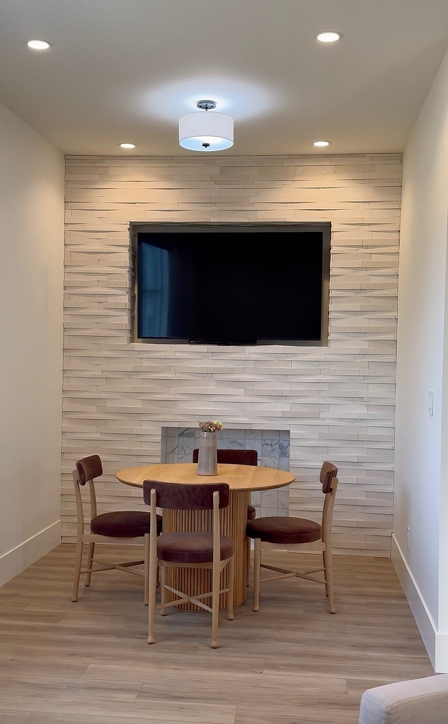 close up of dining room / breakfast table / tv for nearby living room