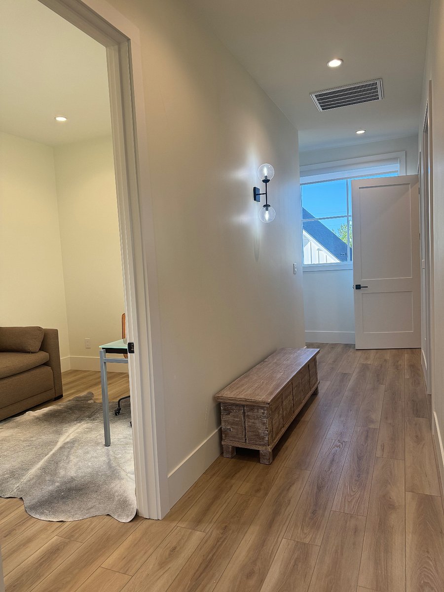 View of Front Door to Apartment at top of Staircase