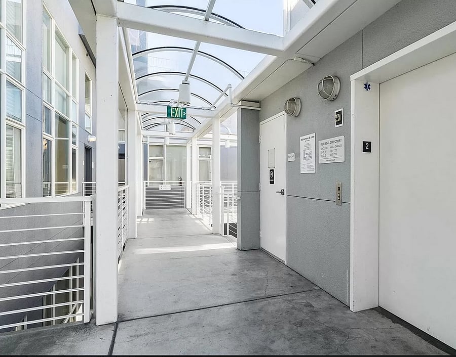 Elevator with Covered Walkways