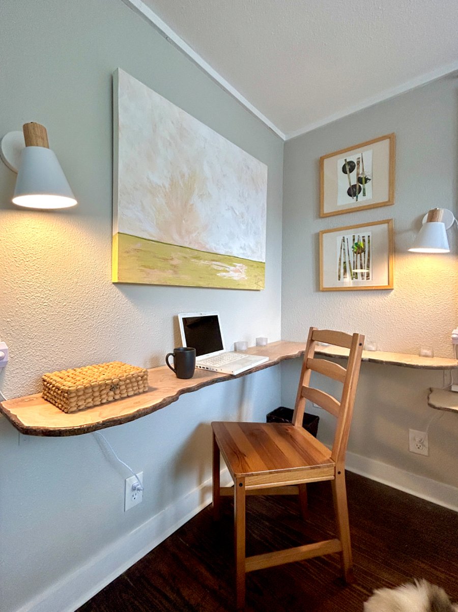 Work area with access to 2 outlets, adjustable swivel lighting