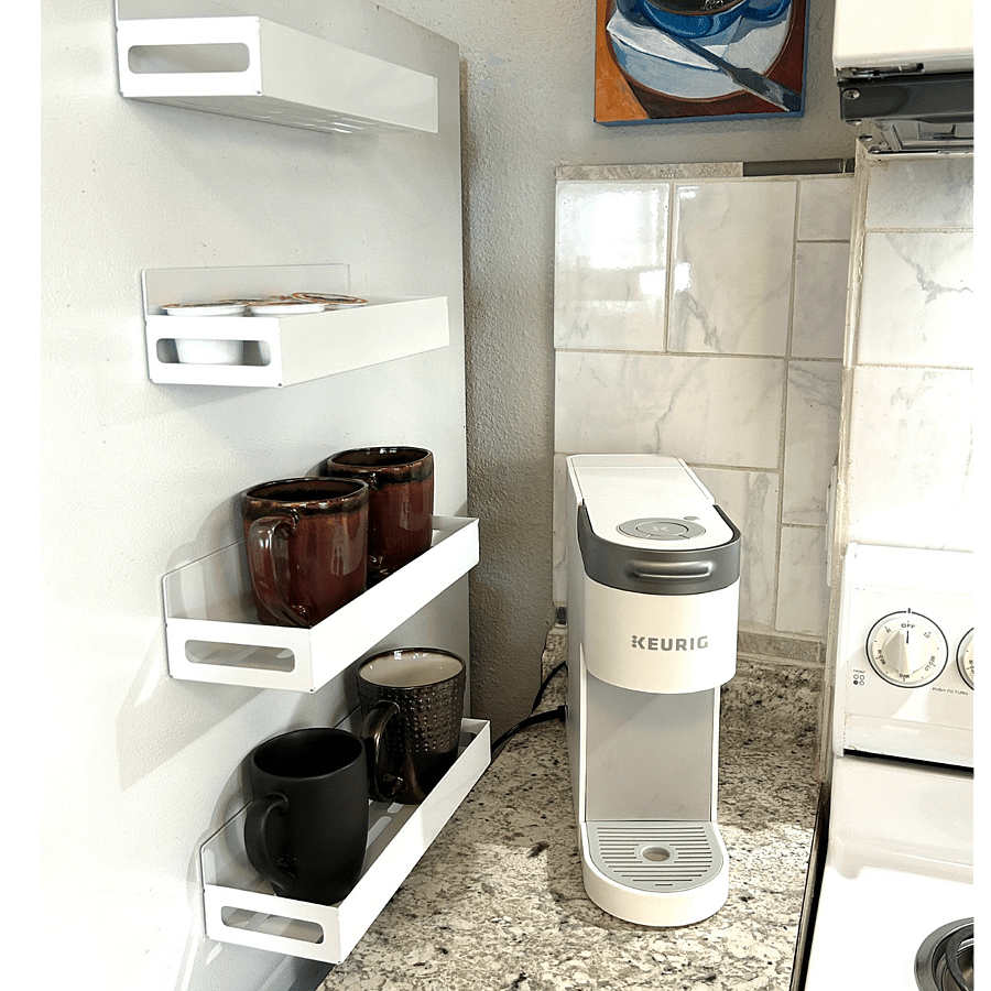 Kurig coffee maker with starter coffee pods. French press also provided