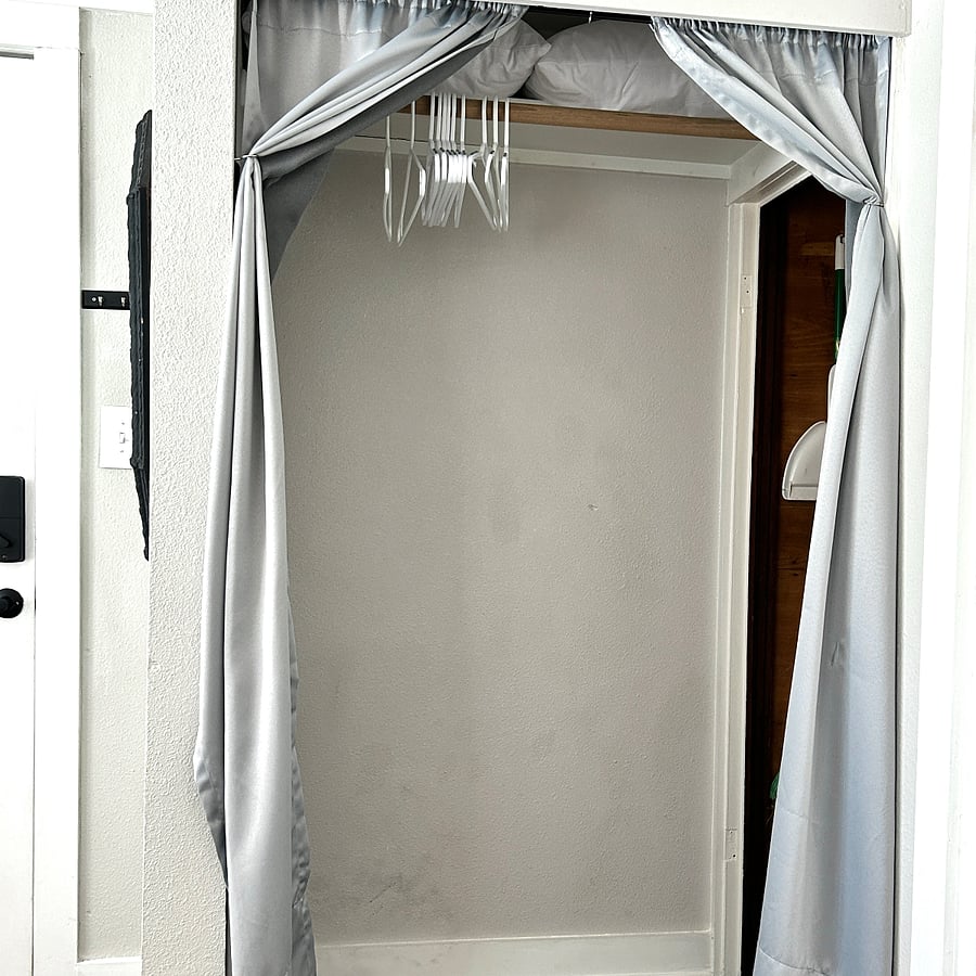 Plenty of closet space with hangers provided , plus out of sight area for ironing board, broom, mop, laundry hamper and extra room fan