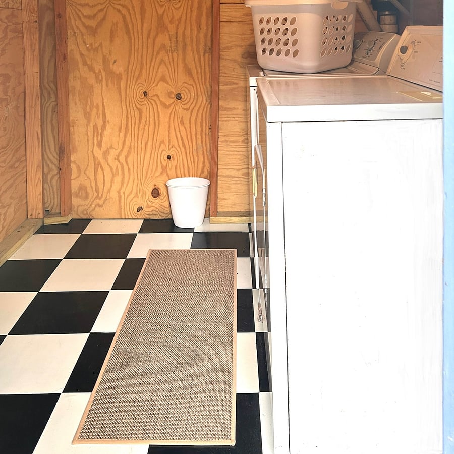Downstairs laundry room with space for storage