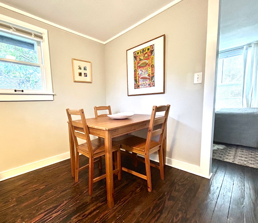 Eat in kitchen with room for four at the table. Extra chair moves easily from kitchen to living room