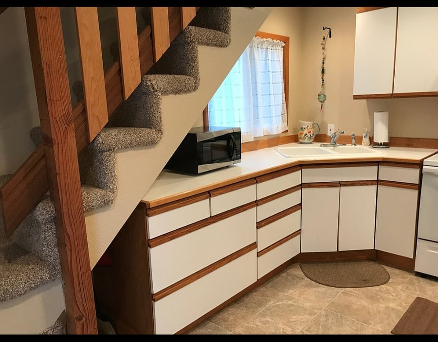 from the entry way, stairs and walk into the kitchen