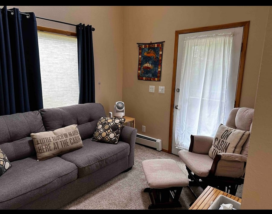 Living area with pull out couch and 2nd entry way