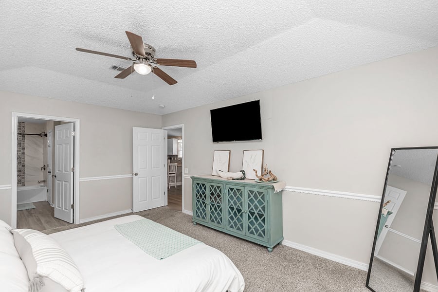 Primary Bedroom
- King Size Bed
- Smart TV
- Full Length Mirror