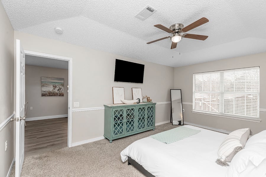 Primary Bedroom
- King Size Bed
- Smart TV
- Full Length Mirror