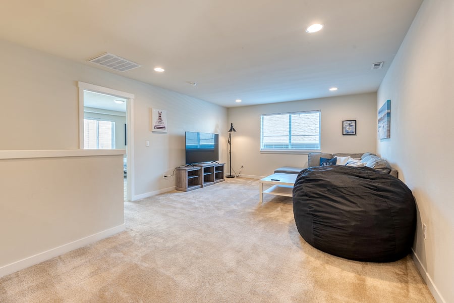 Spacious Upstairs living room. Perfect for movie nights!