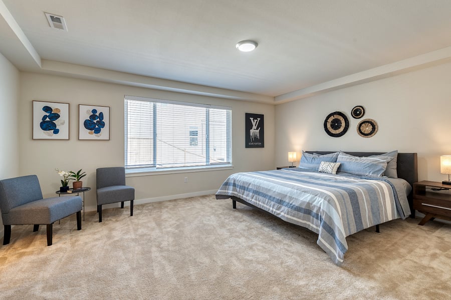 Oversize, Primary Bedroom with King Bed and Accent chairs to lounge and read.