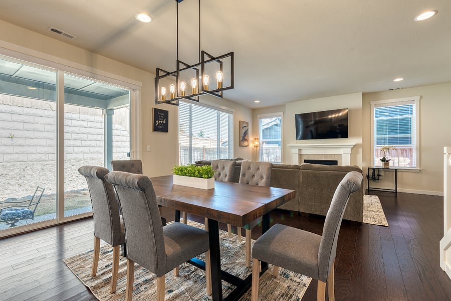 Another view of the dining area and the backyard patio access