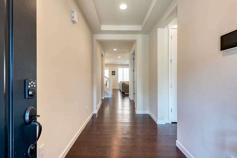 Entry area looking into the main hallway! High ceilings and LED lights