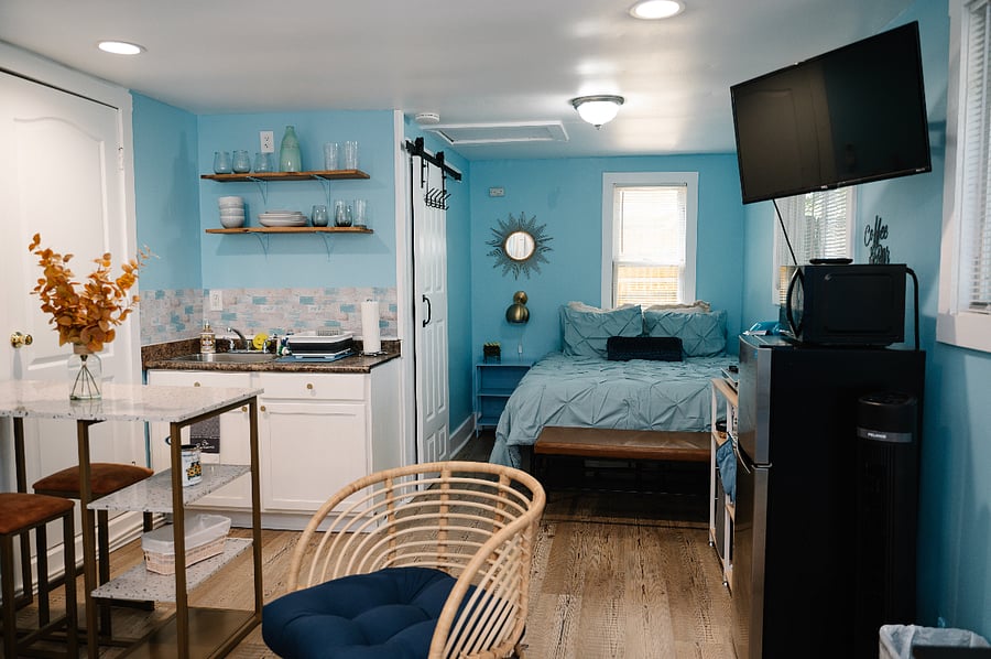 Kitchenette with Island & stools. dishware, pots & pans, glasses, utensils all included