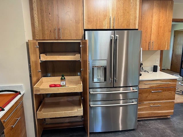 Pantry shelves slide out. New full-depth GE Cafe refrigerator