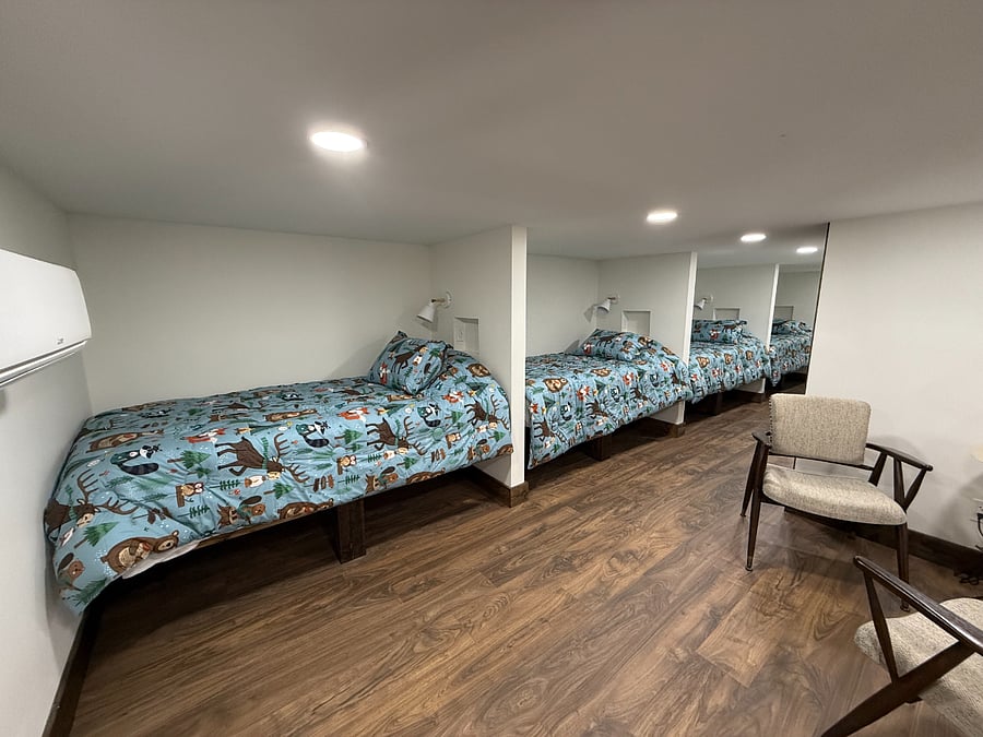 Four XL Twin-Size beds in the loft area