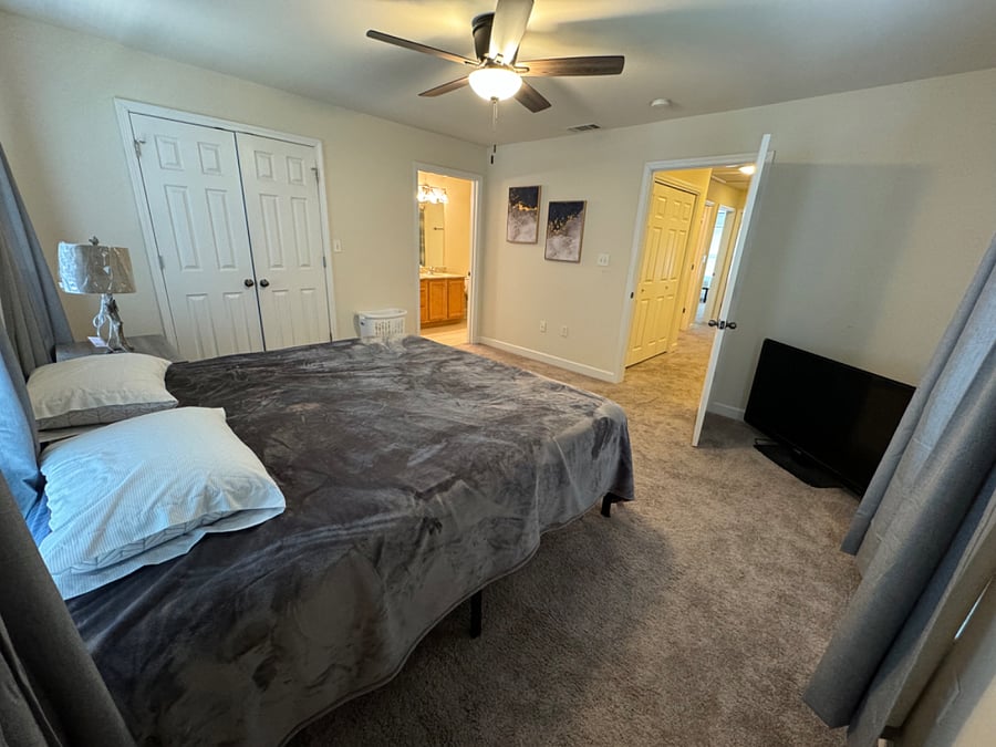 Spacious master bedroom with en suite bathroom (tall dresser also included, not shown in the picture)