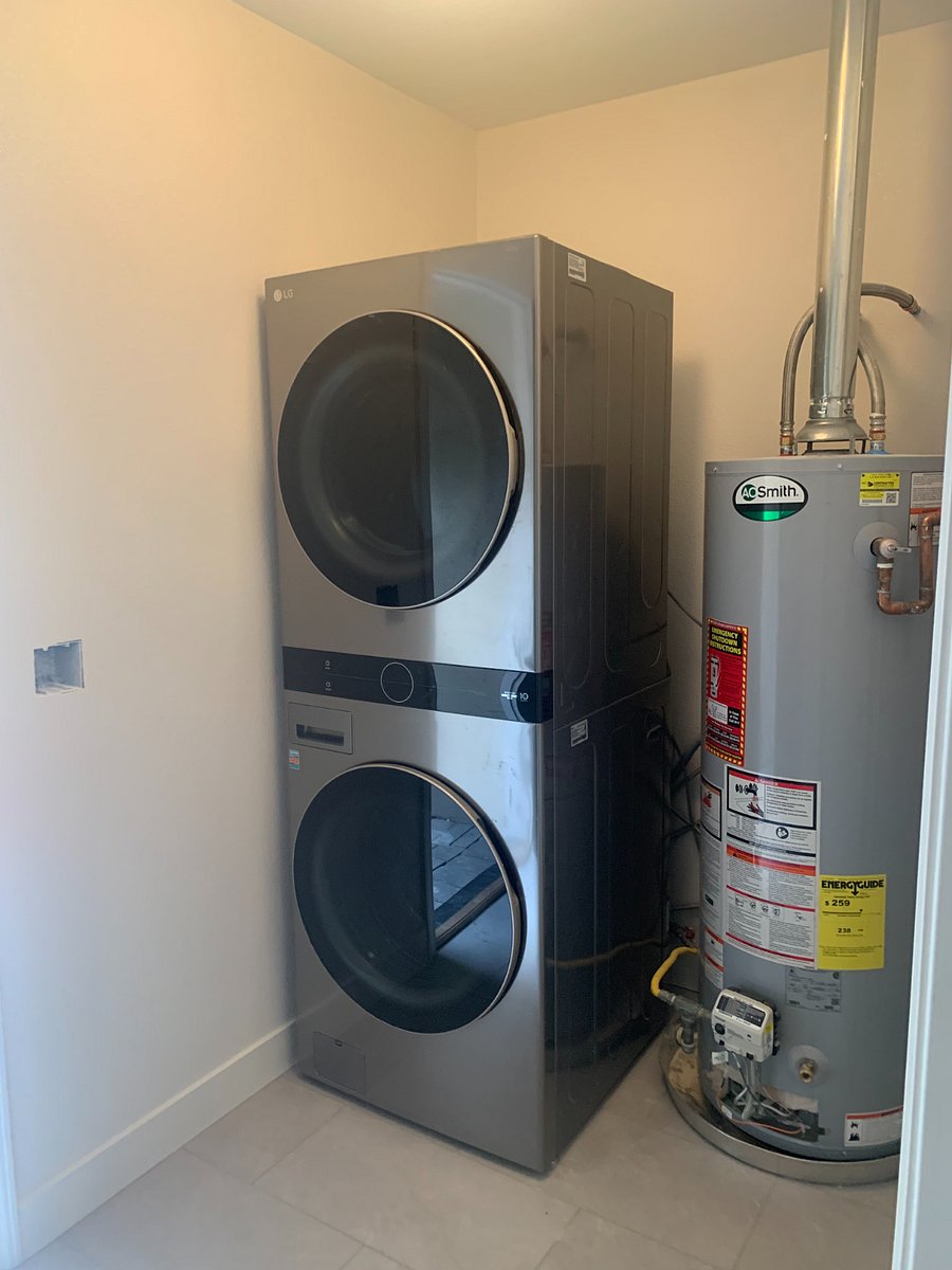 Brand new stackable washer & dryer.  Private entry to laundry room. Facilities shared with home owner. 