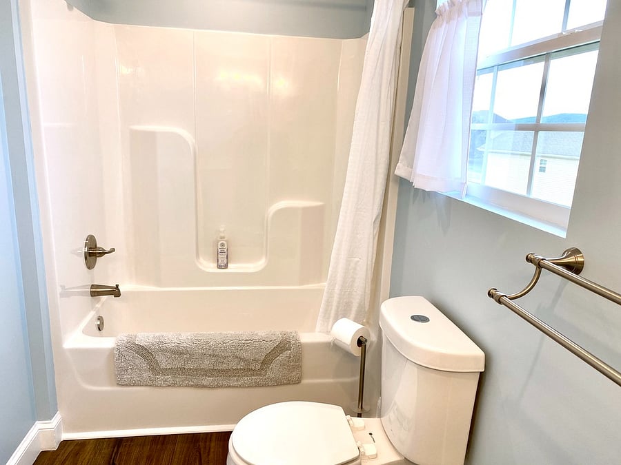 2 full bathrooms with shower/tubs upstairs.