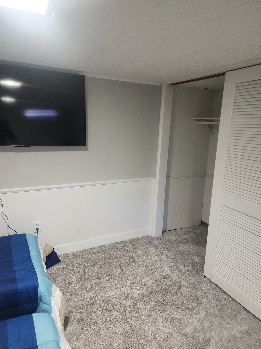 Upon request, the multi-purpose room in the basement can be set up as a third bedroom with two roll-away beds