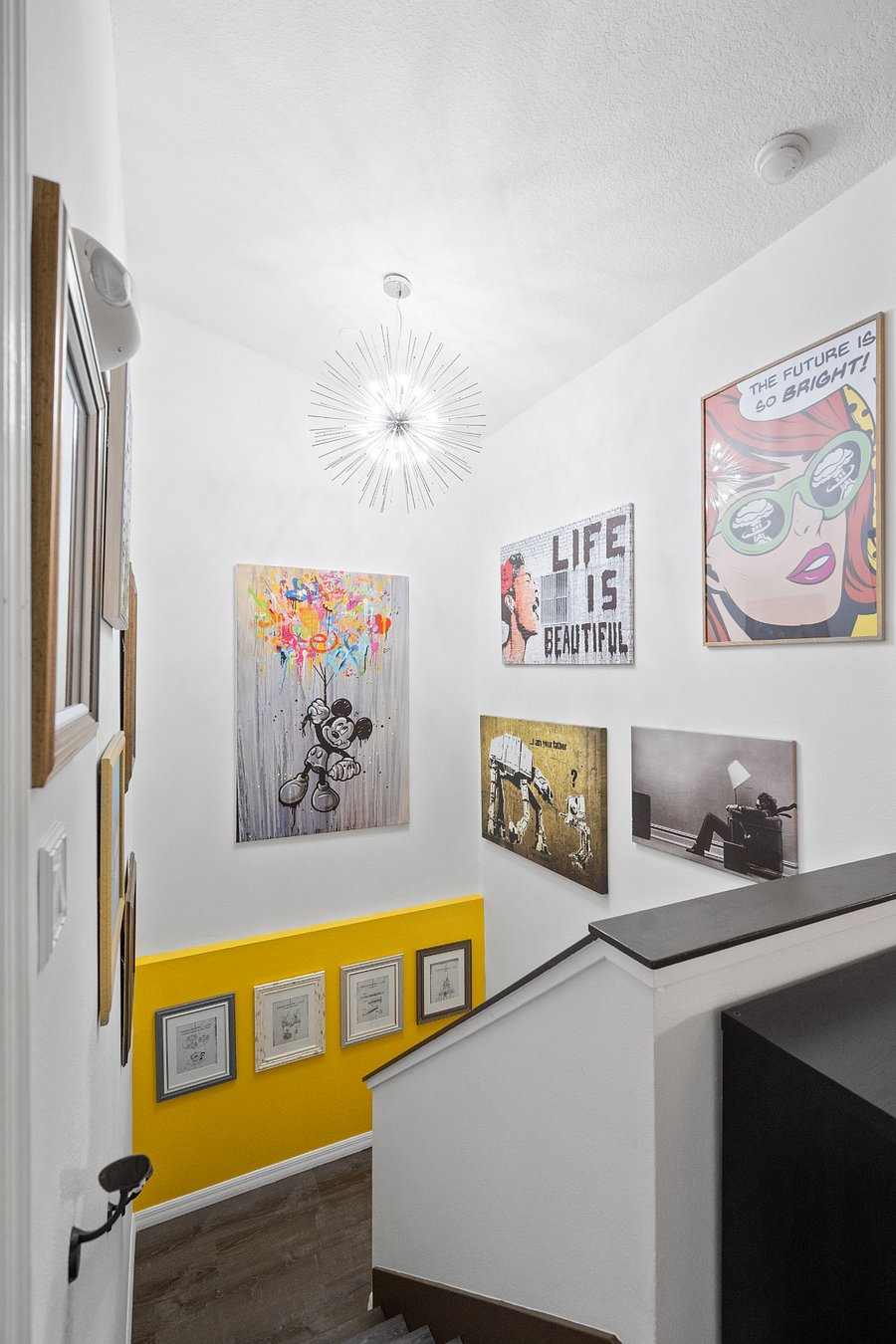 Time to retire for the night? Climb our art gallery stair case to the 3 other bedrooms.