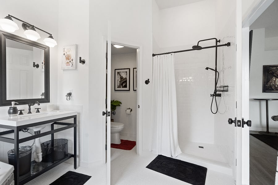 Spacious primary bathroom with walk-in shower and plenty of room for everyday routines.