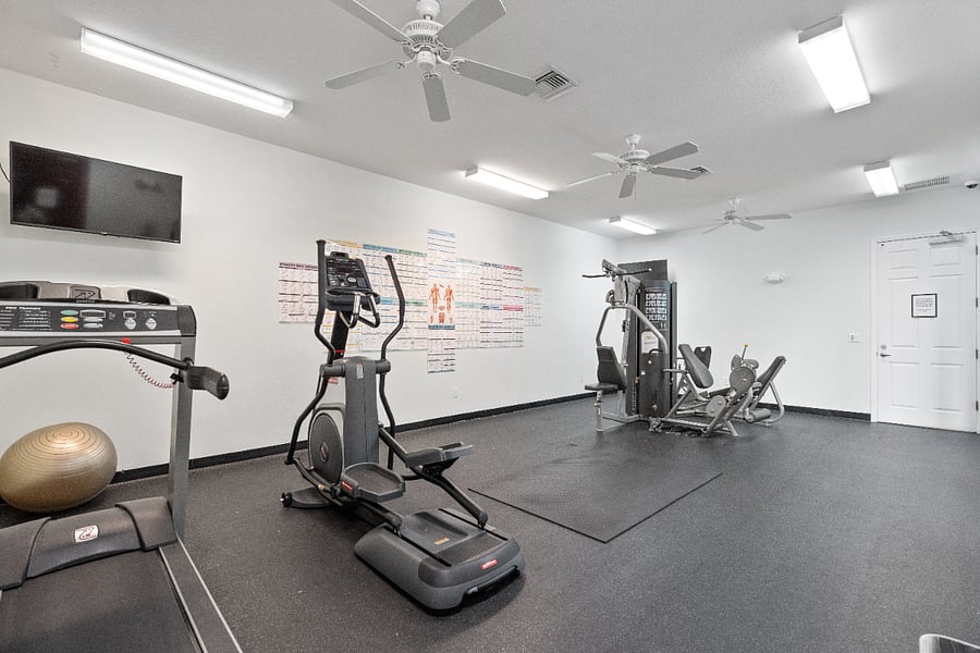 On-site community fitness center for extended-stay guests.