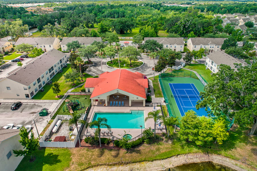 Community clubhouse and swimming pool and tennis courts available to residents and guests.