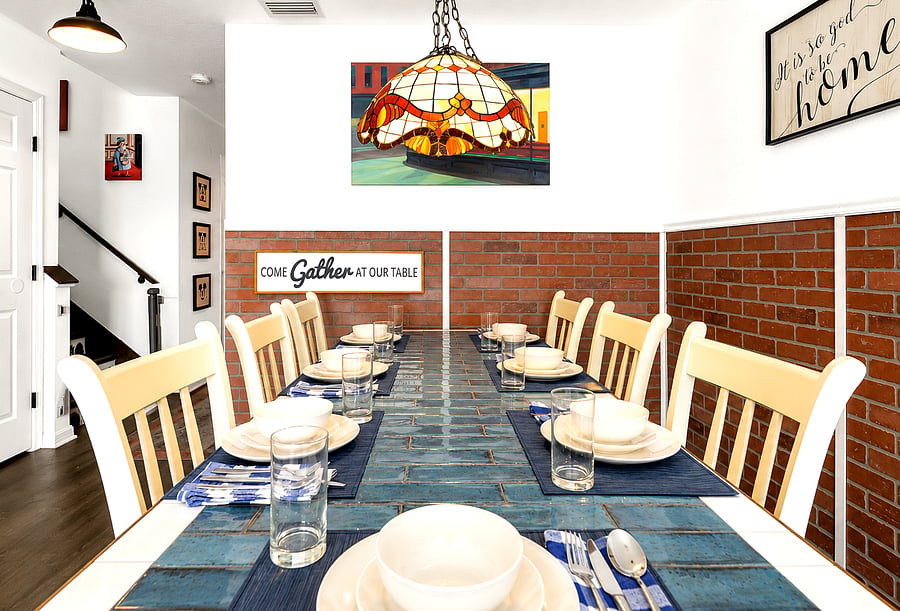 Full dining area with seating for family meals, homework or additional workspace.