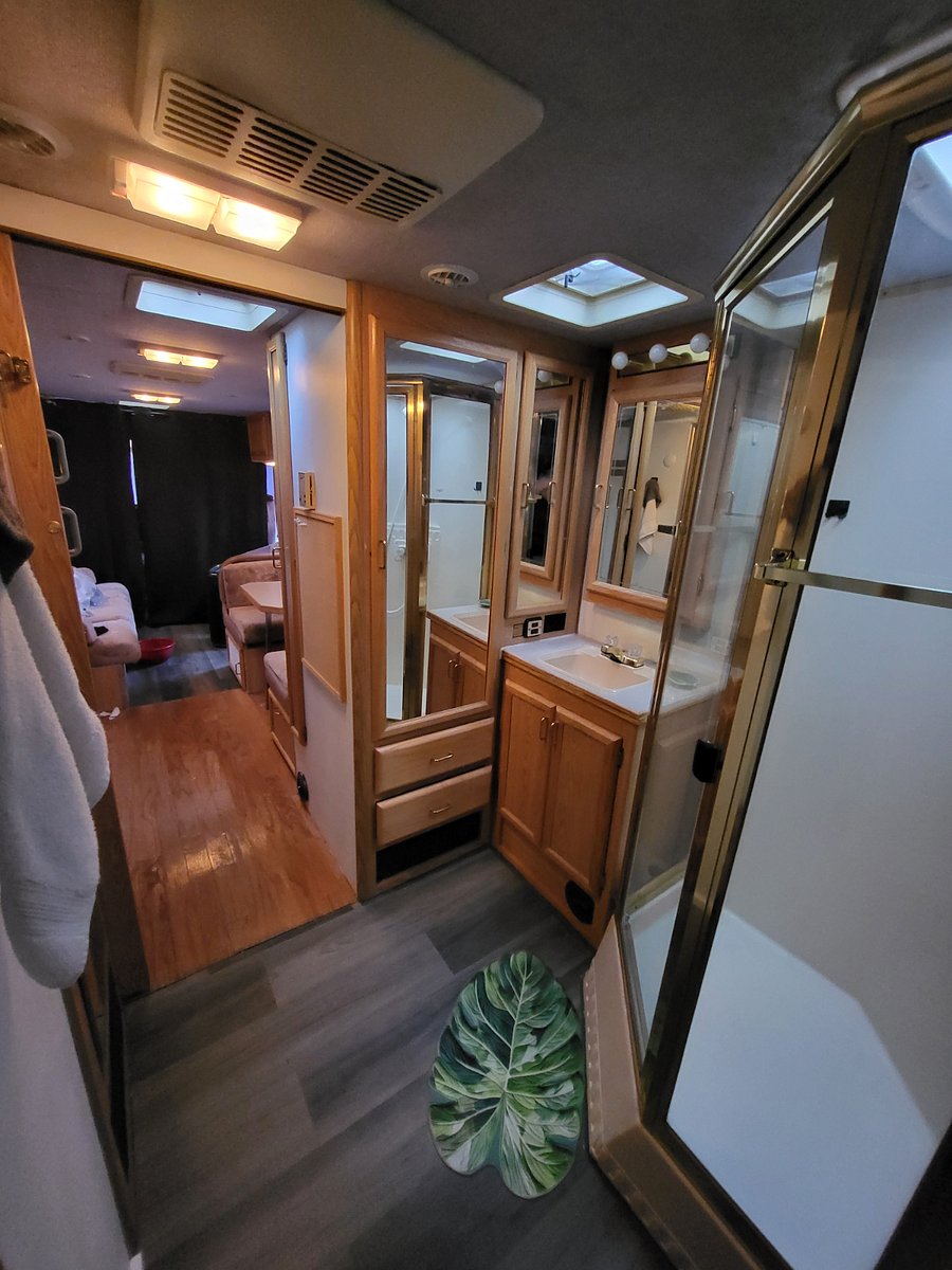 The driver and passenger seats are hidden behind curtains, great place to store your large items like suitcases.