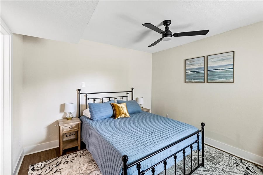 Downstairs primary bedroom with queen bed and on-suite.