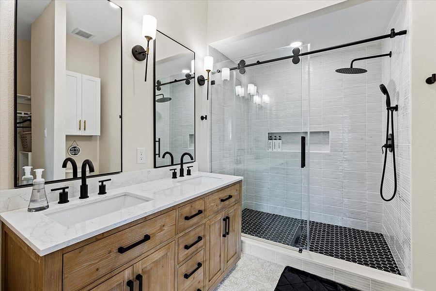 Upstairs primary suite with glass shower