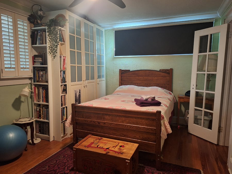 Master Bedroom with closets on the right and left. . Washer and Dryer on the right through the door.
