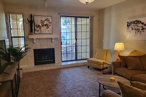 Living room, with sliding glass door to patio