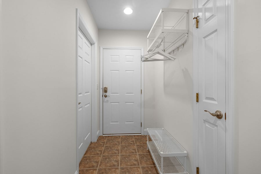 Entry door and drop zone for coats and shoes. The closet is located across from bathroom (see floor plan)
