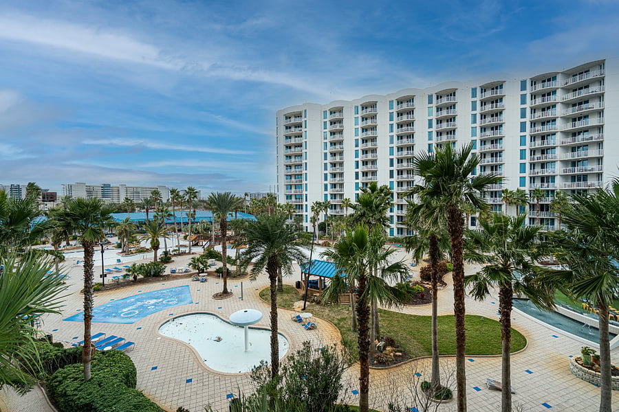 Relax on the balcony and take in the scenic pool view